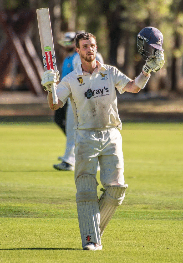 Luke McNamee celebrating a century for Gosnells Cricket Club